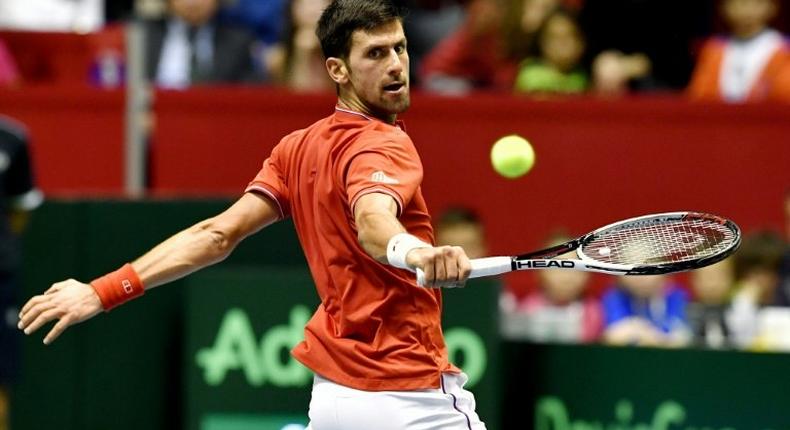 Serbia's Novak Djokovic returns the ball to Spain's Albert Ramos-Vinolas during their Davis Cup World Group quarter-finals singles match, in Belgrade, on April 7, 2017