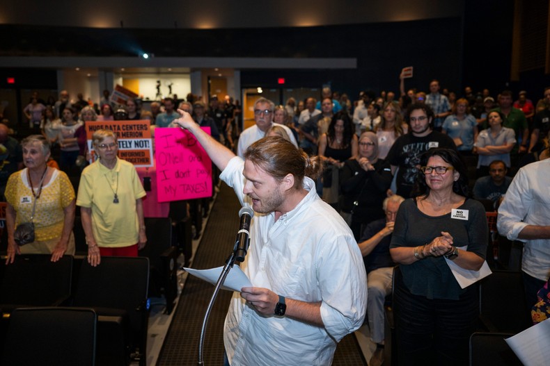 A resident opposing the data center speaks during the meeting.Joe Lamberti for BI