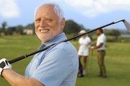 Portrait of mature male golfer