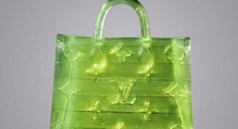MSCHF's Microscopic Handbag based on the Louis Vuitton OnTheGo Monogram bag.MSCHF