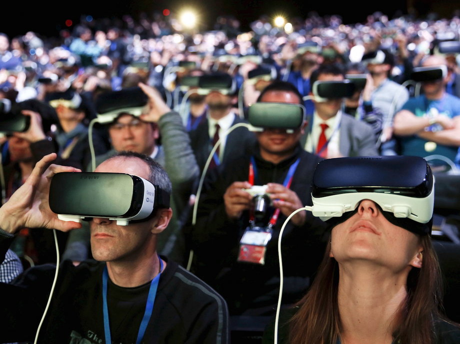 People wear Samsung Gear VR devices as they attend the launching ceremony of the new Samsung S7 and S7 edge smartphones during the Mobile World Congress in Barcelona, Spain, February 21, 2016.