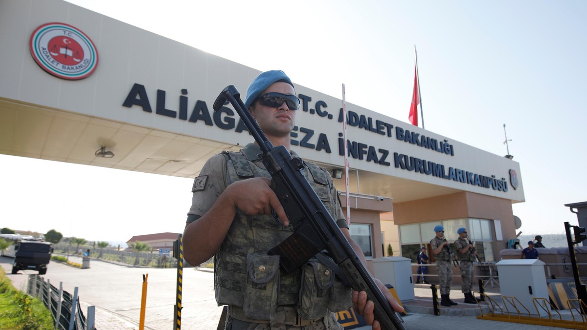 A Turkish soldier stands guard in front of the Aliaga Prison and Courthouse complex in Izmir