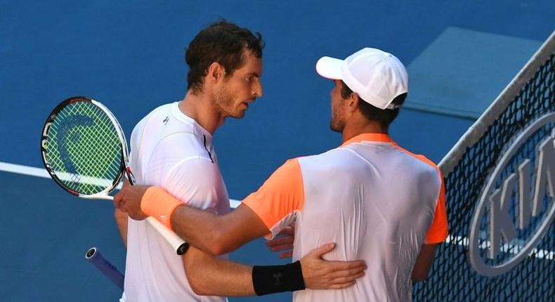 World number one Andy Murray (L) has been dumped out of the Australian Open in the fourth round by 50th-ranked Mischa Zverev (R)