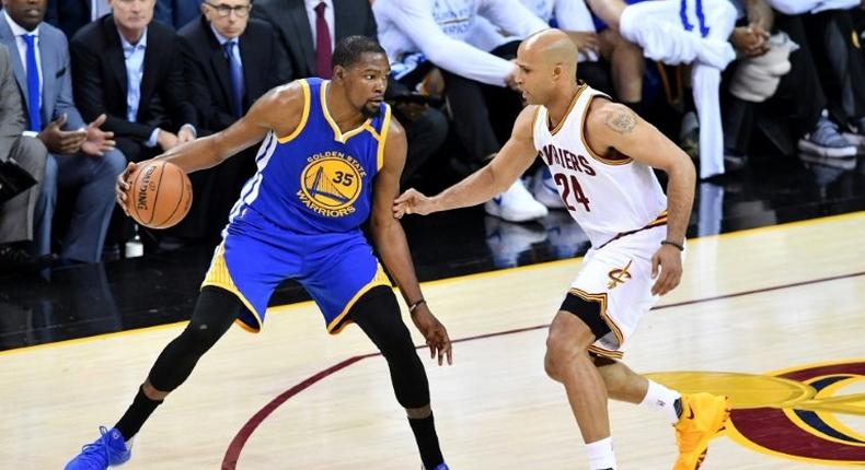 Kevin Durant of the Golden State Warriors looks to get past Richard Jefferson of the Cleveland Cavaliers in Game 3 of the 2017 NBA Finals in Cleveland, Ohio