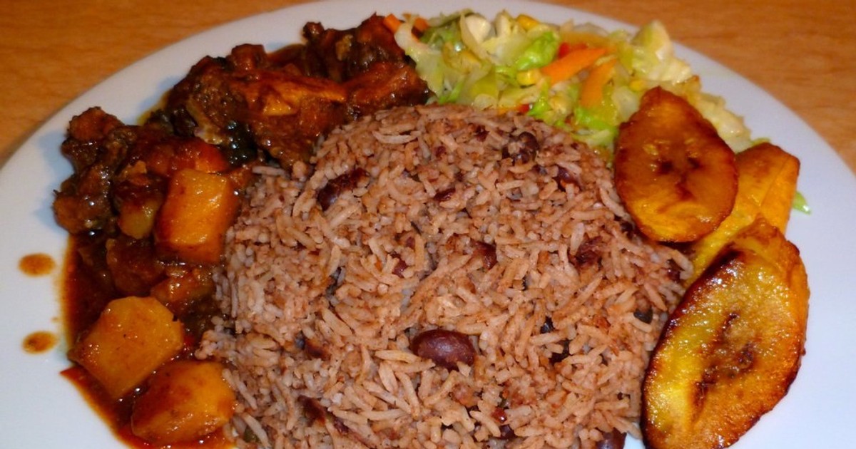 Try waakye with chicken stew, fried plantain and steamed cabbage
