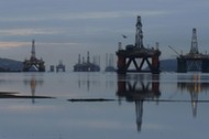 Drilling rigs are parked up in the Cromarty Firth near Invergordon, Scotland