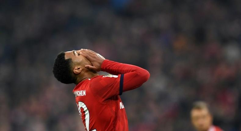 Serge Gnabry reacts in frustration after scoring Bayern Munich's opening goal on 80 minutes, only for Freiburg to equalise just before the final whistle to leave the defending German champions four points behind Bundesliga leaders Borussia Dortmund.