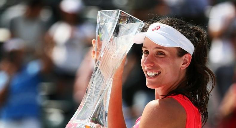 Johanna Konta of Great Britain holds the winner's trophy after defeating Caroline Wozniacki of Denmark after the Women's Final on Day 13 of the Miami Open at Crandon Park Tennis Center on April 1, 2017 in Key Biscayne, Florida