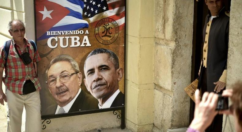 A poster in Havana shows Cuban and US Presidents Raul Castro and Barack Obama, who in December 2014 announced simultaneously their nations would normalize relations