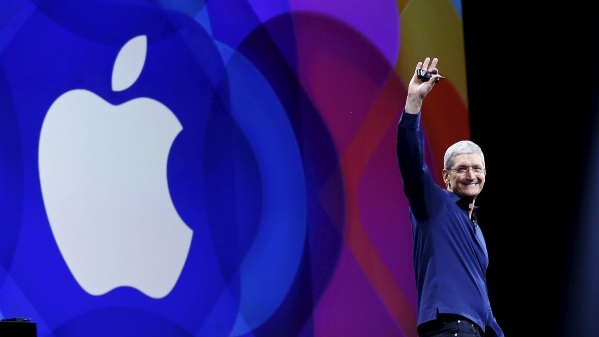 Apple CEO Tim Cook waves as he arrives on stage to deliver his keynote address at the Worldwide Developers Conference in San Francisco