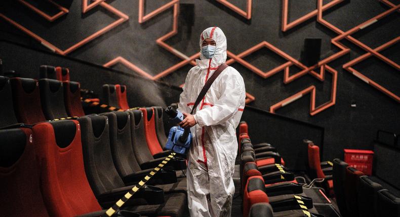 A cinema in Wuhan is disinfected as the area moved to reopen during the COVID-19 pandemic on July 20, 2020.
