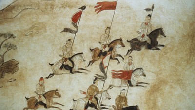 Murals picturing soldiers on horseback on the wall of the