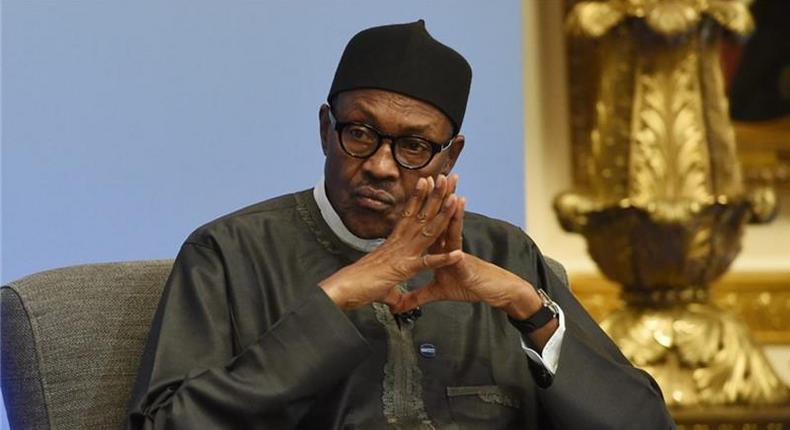 President Muhammadu Buhari in a sad mood (Vanguard)