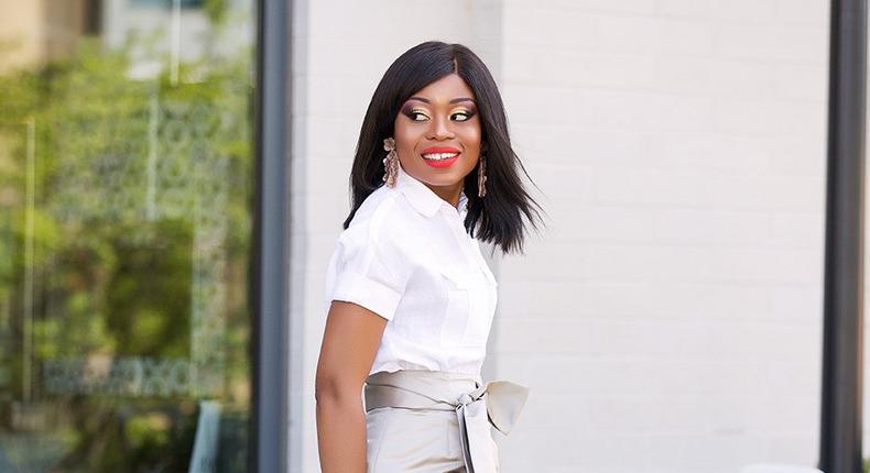 Stella Uzor does skirt with chic details with white shirt