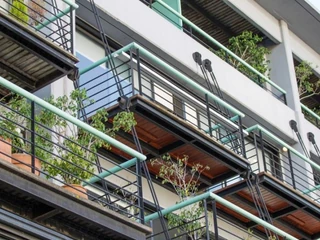 Kozzi-apartment_building_with_balconies-883x588