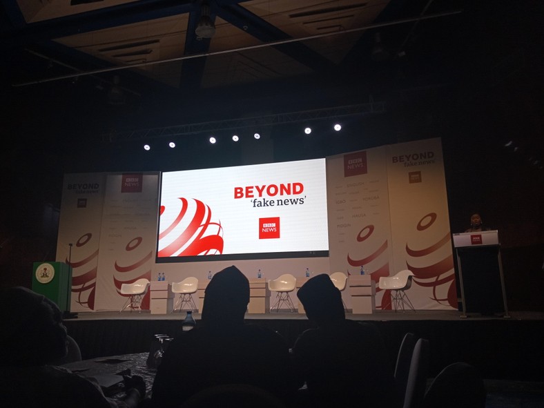 Head of BBC West Africa Languages, Oluwatoyosi Ogunseye, delivering the welcome address at the 'Beyond Fake News' conference. 