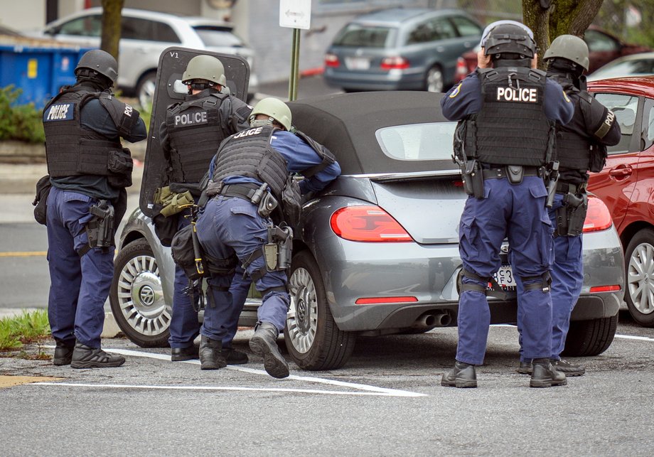 Police maintain a cordon after the Fox45 television station was evacuated due to a bomb threat in Baltimore, Maryland, U.S. April 28, 2016.