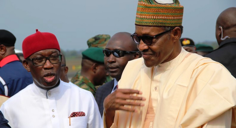 President Muhammadu Buhari (R) and Delta State Governor, Ifeanyi Okowa. [Twitter/@BashirAhmaad]