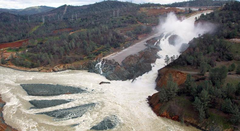 An aerial view of the damaged Oroville Dam spillway is shown. Dams in the US are aging. In fact, the average age of of US dams is 56 years.