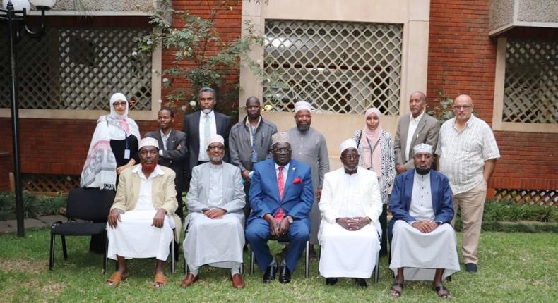 Education Cabinet Secretary George Magoha alongside Muslim leaders at a meeting in Nairobi on July