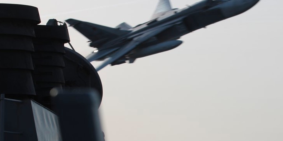 A Russian Su-24 attack aircraft making very low altitude pass by the USS Donald Cook on April 12, 2016.