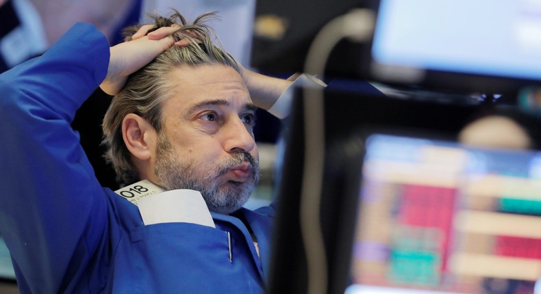 A trader works on the floor at the New York Stock Exchange (NYSE) in New York City, U.S., March 5, 2020.