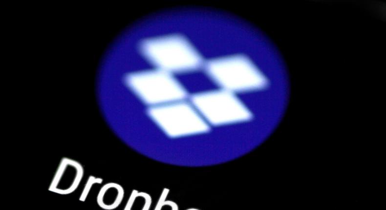 FILE PHOTO: The Dropbox app logo seen on a mobile phone in this illustration photo October 16, 2017.   REUTERS/Thomas White/Illustration