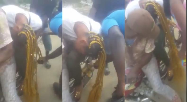 Lady’s long hair gets entangled in the wheels of motorbike