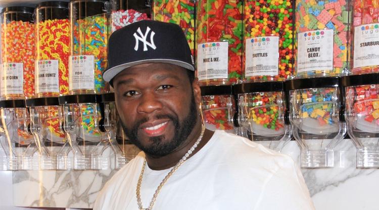 50 Cent a klasszikus féldolláros mosolyával