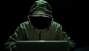A person hacking people's password using a computer.Getty Images