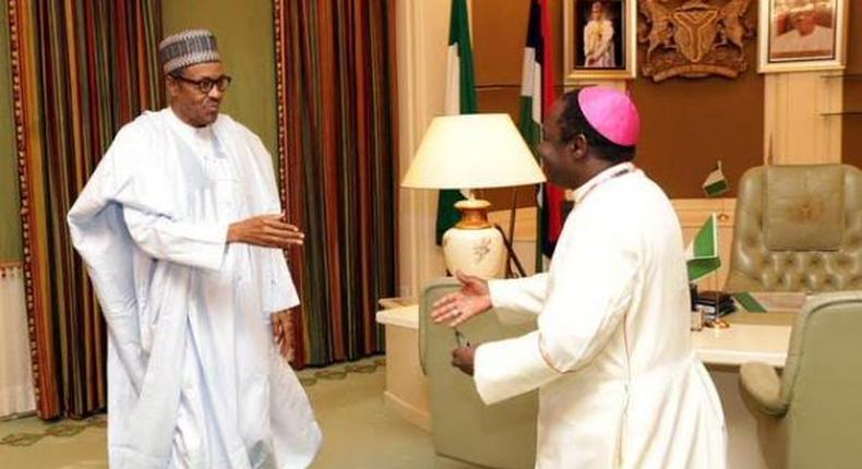 President Muhammadu Buhari meets with Reverend Matthew Kukah on August 27, 2015