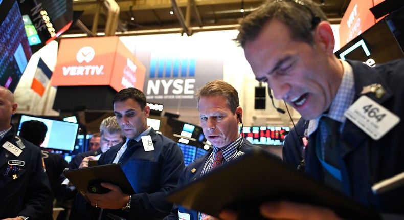 Traders work during the opening bell at the New York Stock Exchange (NYSE) on February 28, 2020 at Wall Street in New York City.
