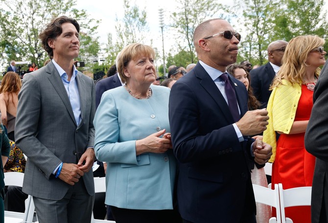 Džastin Trudo i Angela Merkel 
