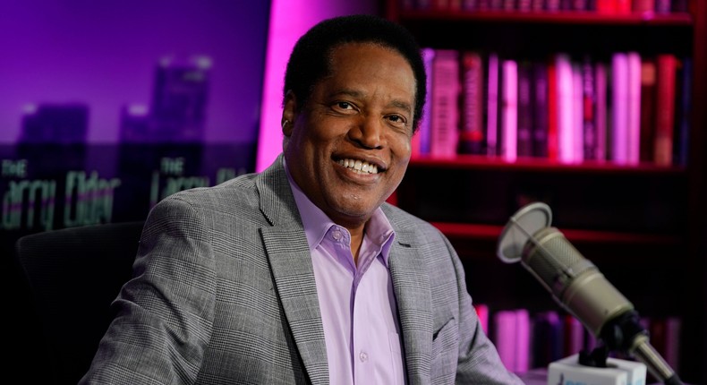 In this July 12, 2021 file photo, radio talk show host Larry Elder poses for a photo in his studio in Burbank, Calif.
