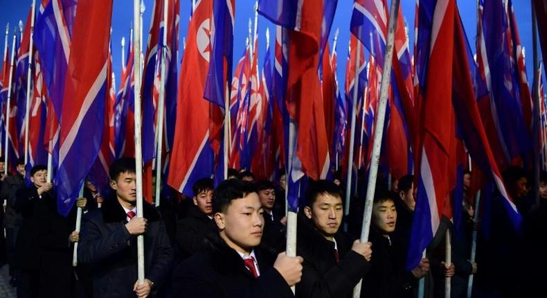 New Year rallies in Pyongyang were attended by thousands chanting communist slogans and support for leader Kim Jong-un