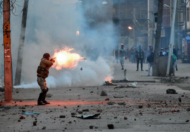 Indian Police and Protestors Clash In Kashmir