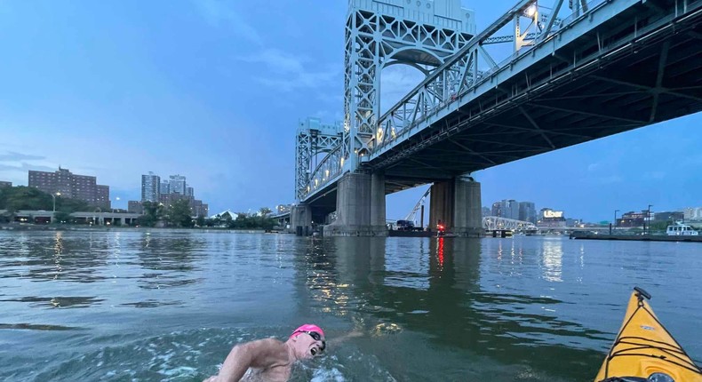 Ed Horne swimming under one of New York City's bridges.Courtesy of the author