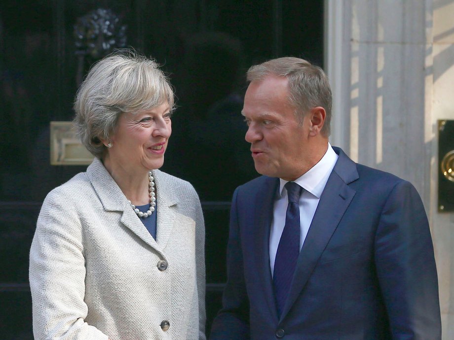 Britain's Prime Minister Theresa May (L) greets European Council President Donald Tusk in Downing Street in London, Britain September 8, 2016.