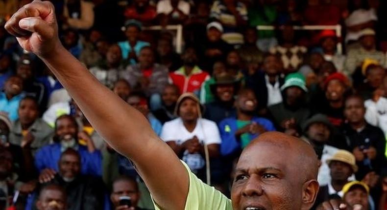 President of South Africa's Association of Mine workers and Construction Union (AMCU) Joseph Mathunjwa addresses strikers in Rustenburg, South Africa May 14, 2014. 