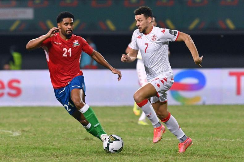 Youssef Msakni (R) scored to give Tunisia a shock Africa Cup of Nations last-16 victory over Nigeria in Garoua
