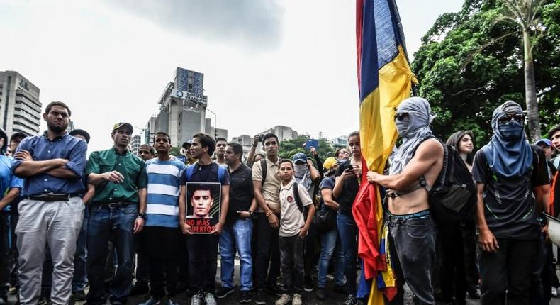 Venezuela opposition leader Henrique Capriles joins a march paying tribute to student Juan Pablo Pernalete killed during a protest against President Nicolas Maduro