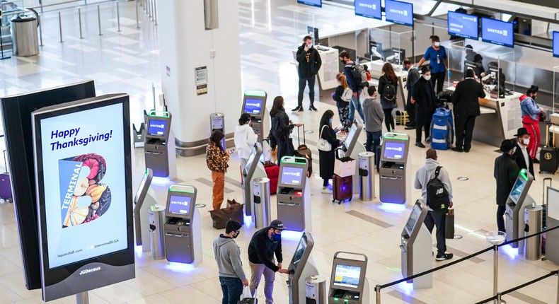 Travelers at New York's LaGuardia Airport.