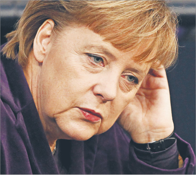 Kanclerz Merkel ma problem z zatwierdzeniem w parlamencie postanowień szczytu strefy euro Fot. Reuters/Forum