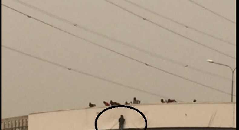 The suicidal hanging on the pedestrian bridge