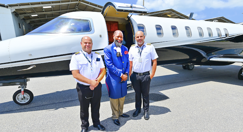 Prophet David Owuor with two pilots of a private jet he was honoured with for his gospel activitIes during his Brazil mission.