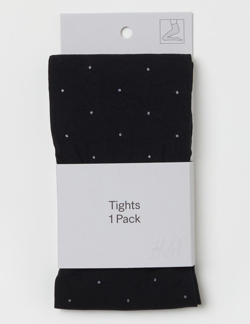Collants noirs scintillants avec des pois brillants et taille élastique de H&M pour environ 15 francs. 