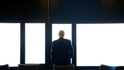 Republican U.S. presidential nominee Donald Trump looks out at Lake Michigan during a visit to the M