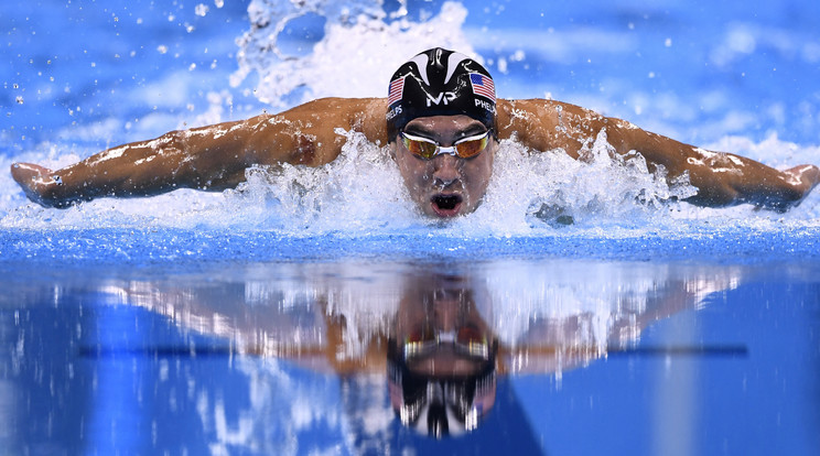 Michael Phelps a váltóval 
szerzett aranyérmeket is számolva, már huszonkétszeres 
olimpiai bajnok / Fotó: AFP