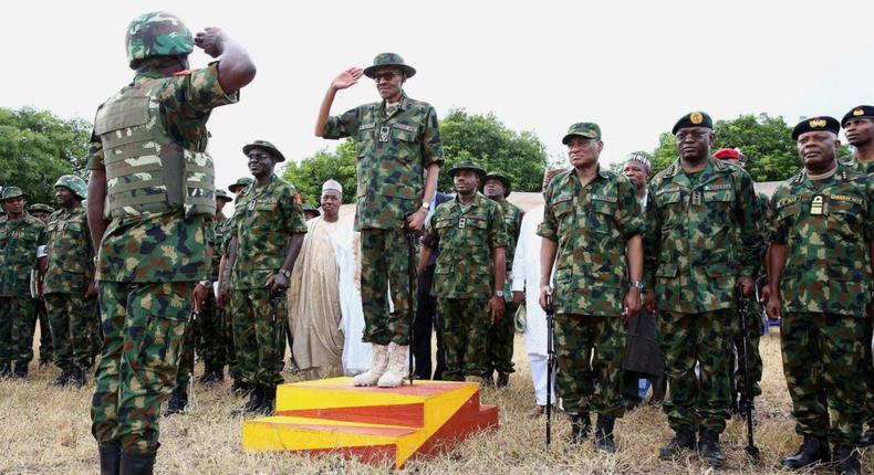 President Muhammadu Buhari pictured in Army uniform during the flag off of the 2016 Army celebration in Gusau, Zamfara State (Premium times)