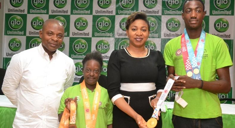 (R-L): Special Olympics Athlete, Chima Maduakor; State Head, SME, Lagos Zone, Globacom, Marie Macfoy; Special Olympics Athlete, Tejumola Ogunlela and Manager, Sports Programmes, Special Olympics Nigeria, Adeola Oladugba, at the reception held by Globacom for two out of the athletes sponsored by the company to the just concluded Special Olympics recently in Lagos.
